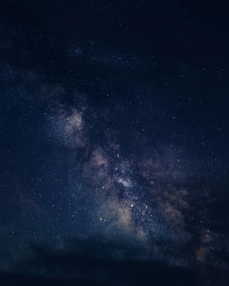 Space galaxy night sky filled with stars and colorful clouds in ultra high definition 4K for AMOLED mobile and desktop wallpapers