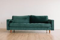 green fabric sofa wallpaper