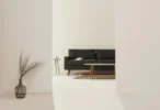 Minimalist Black & Brown Leather Tub Sofa 4K Wallpaper Minimalist Black & Brown Leather Tub Sofa 4K Wallpaper