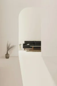 Minimalist Black & Brown Leather Tub Sofa 4K Wallpaper